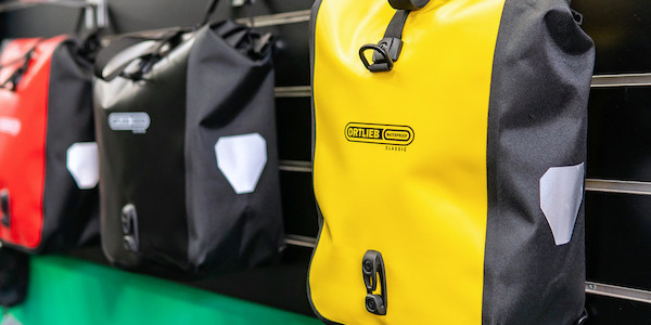 A range of Ortlieb Sport-Roller Classic panniers in Yellow, Black and Red