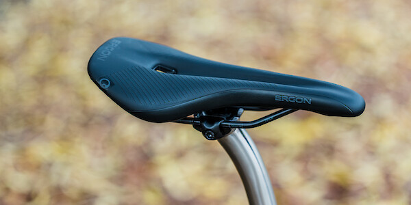 An Ergon saddle fitted to a titanium bicycle seat post