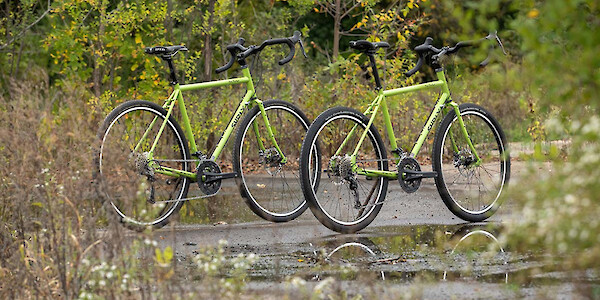 A pair of Surly Disc Trucker touring bikes in Pea Lime Soup