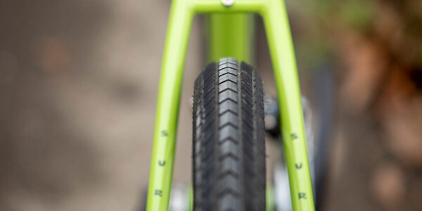 Surly Disc Trucker touring bike in Pea Lime Soup, tyre clearance detail