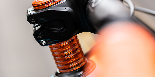 Orange headset spacers on an Ibis Ripmo V2 carbon mountain bike