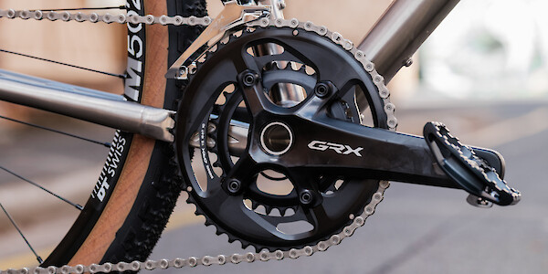 Shimano GRX crankset detail on a Bossi Grit SX titanium gravel bike