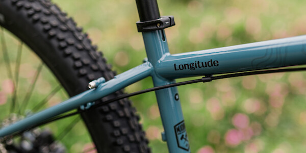 Genesis Longitude bicycle in Clean Slate blue, top tube detail