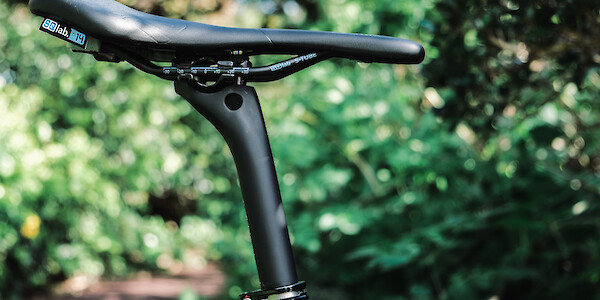 An SQ-Lab saddle and carbon Bossi seat post, fitted to a titanium Bossi Grit SX bicycle