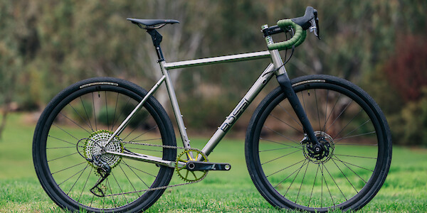 Bossi Grit SX titanium gravel bike, against a backdrop of greenery