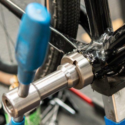 A Cyclus bottom bracket facing tool being used on a bicycle frame