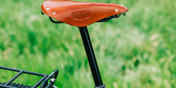 A Brooks B17 Classic saddle in Honey plus a KS Lev dropper post on a custom-built Surly Karate Monkey bike.