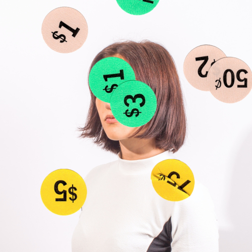 A woman in a white top, coloured discs with different currencies obscuring her face