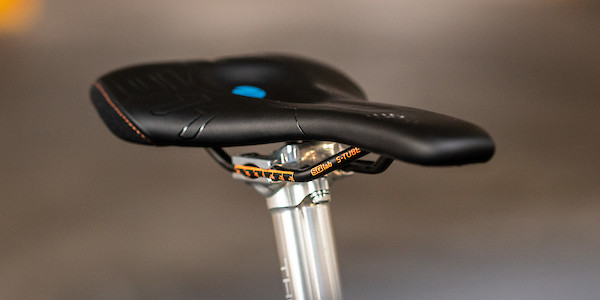 SQ-Lab 611 saddle fitted to a silver Thomson seatpost, shot from a three-quarter angle