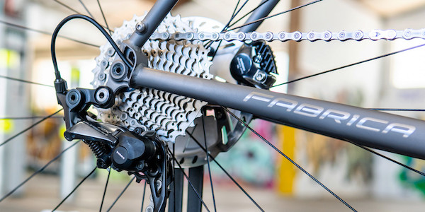 Cassette and rear derailleur detail on a titanium Bossi Grit gravel bicycle
