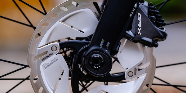 Disc brake detail on a Bossi Grit SX titanium gravel bike