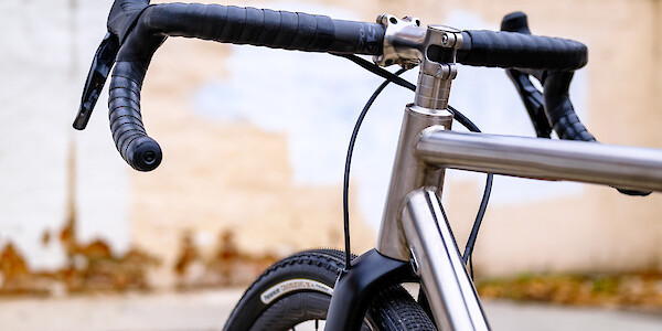 Handlebar detail on a Bossi Grit SX titanium gravel bike