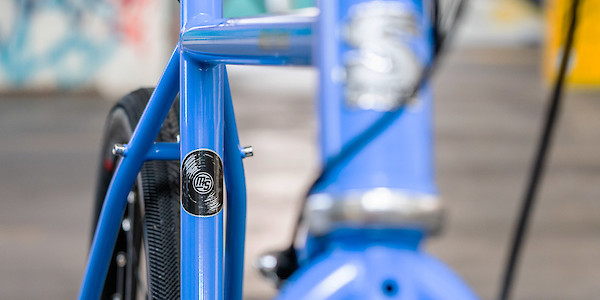 Frame decal detail on a Surly Midnight Special bicycle in Perry Winkle's Sparkle blue