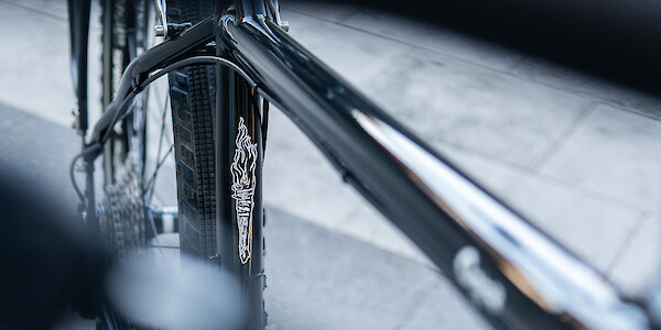 Flame decal detail on a black Surly Ogre frame