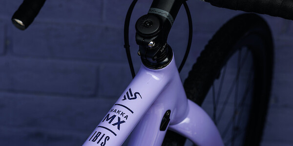 Top tube detail on an Ibis Hakka MX bicycle in Wizard Potion Purple