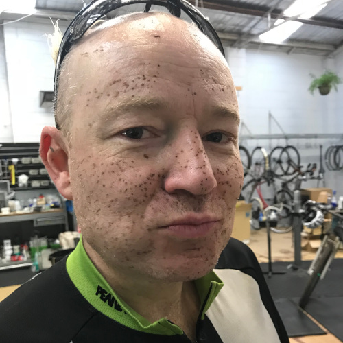 Pete from Bio-Mechanics Cycles & Repairs, spattered with mud after a winter mountain bike ride. He regrets nothing.