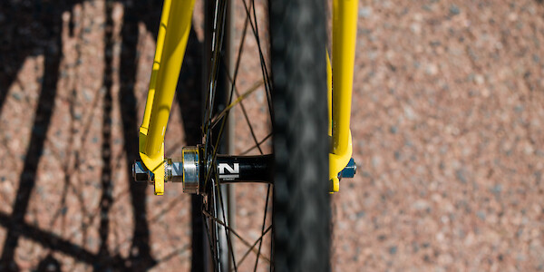 Fork detail on a Surly Steamroller bicycle in Banana Candy yellow