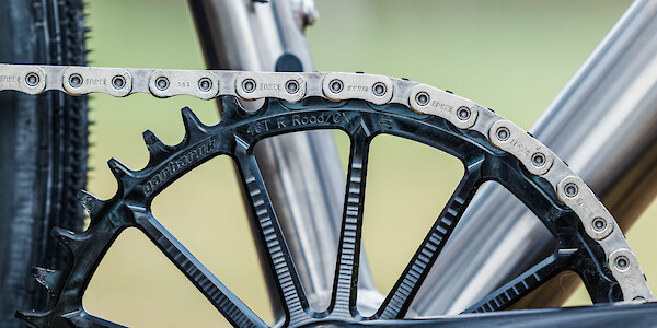 Close-up of a Garbaruk chain ring fitted to a Bossi titanium gravel bike