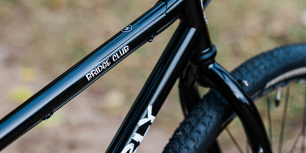 Frame decal detail on a black Surly Bridge Club bicycle