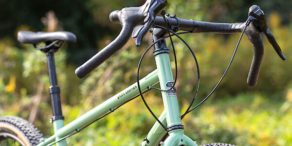 Surly Grappler bike in Sage Green, handlebar detail