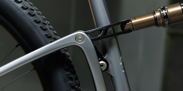 Frame detail on an Ibis Exie USA mountain bike in Mercury Silver