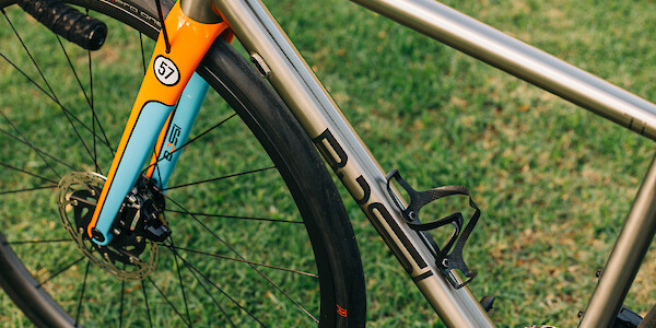 Custom-painted fork detail on a titanium Bossi Summit bicycle by Bio-Mechanics Cycles & Repairs