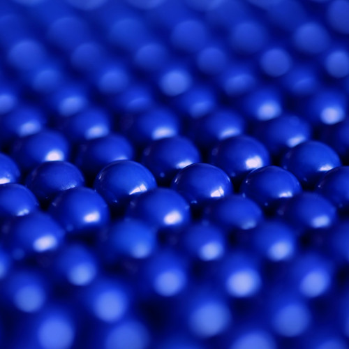 Close up of rows and rows of identical blue balls