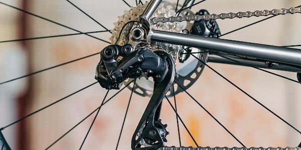 Rear derailleur detail on a custom-built Bossi Strada Classic titanium road bike