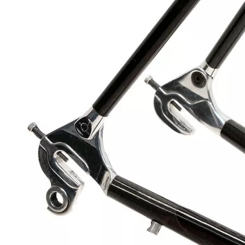 Close up on the alloy drop-out on a vintage carbon bicycle frame.