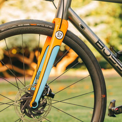 A Bossi bicycle fork custom-painted in Gulf Racing Stream colours, on a custom build made by Bio-Mechanics Cycles & Repairs.