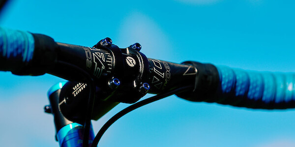 Handlebar detail on a Bossi Grit SS titanium gravel bike, custom-built by Bio-Mechanics Cycles & Repairs