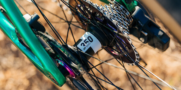 DT Swiss rear hub and purple Hope lock rings on a custom-built Gothic Aix carbon gravel bike