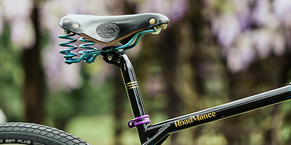 Brooks saddle with airbrushed blue rails and springs